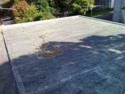 roof at start of work, dirty, tented, wrinkled
