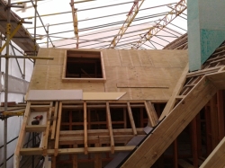 above the east roof, substrate being installed to 45 degree roof to be clad in TPO