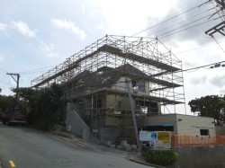 scaffolding extended up for temporary shrink wrap