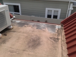 ponding at gutter end of centre roof