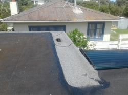the mineral cap layer applied to the gutter